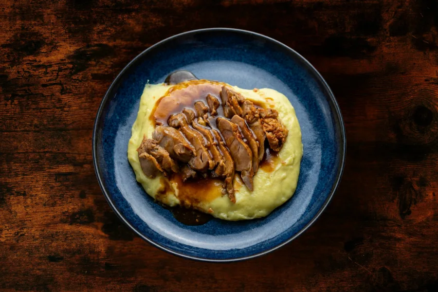 Slow-Roasted Pork Shank with Gravy and Mashed Potatoes